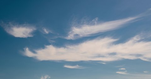 Timelapse of sky background with delicate white cirrus clouds