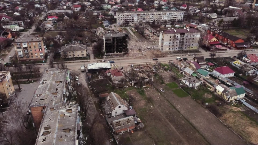 Destroyed buildings and huts after the fighting