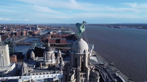 LIVERPOOL, UK - 2022: Establishing aerial view of Liverpool city centre with the Royal Liver Building