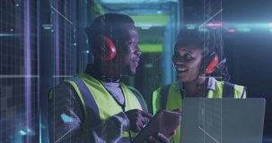 Animation of lights over african american man and woman working in server room. network, programming, computers and technology concept digitally generated video.