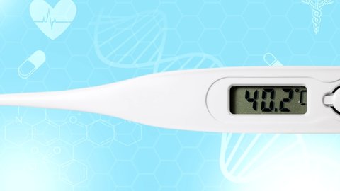 Sanitary or clinic digital thermometer calibrated in degrees centigrade that quickly increases the measured temperature. Fever or illness concept