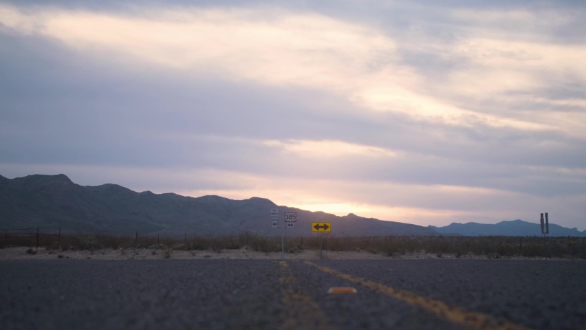 West Texas Mountain Sunset with Low Angle Slide across Highway 4K