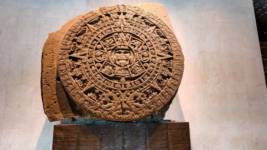 Close-up video of the Aztec calendar found in the Zocalo of Tenochtitlan, Mexico City Royalty-Free Stock Footage #1090456521