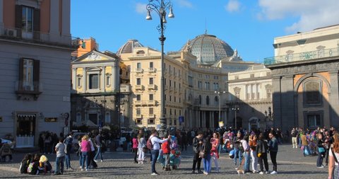 Naples , Italy - 05 09 2022: Panning across famous, historic and colorful Galleria Umberto I filmed from Piazza del Plebiscito