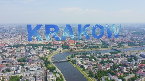 Inscription on video. Krakow, Poland. Wawel Castle. Ships on the Vistula River. View of the historic center. Text from small balls, Aerial View