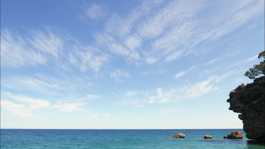 Beautiful seascape at sunny summer day. Rocky coastline of Mediterranean Sea | Shutterstock HD Video #1090467401