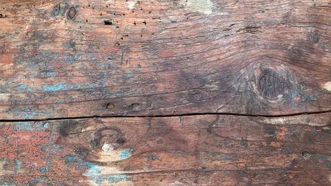 Wood texture with veins and blue paint scuffs. For advertising, video presentation.