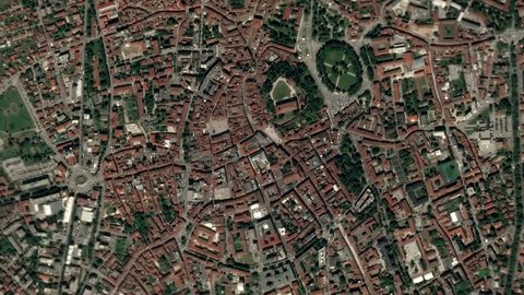 Earth zoom in from space and focus on Udine, Italy. The animation continues by zoom out through clouds and atmosphere into space. Background for travel intro.