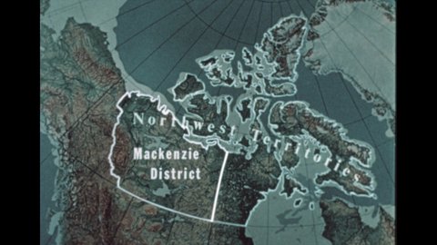 1970s: waterways in Yukon. Mackenzie District on map. Keewatin District on map. Franklin District. Northwest Territories. Interior Plains. Glacial river and forest