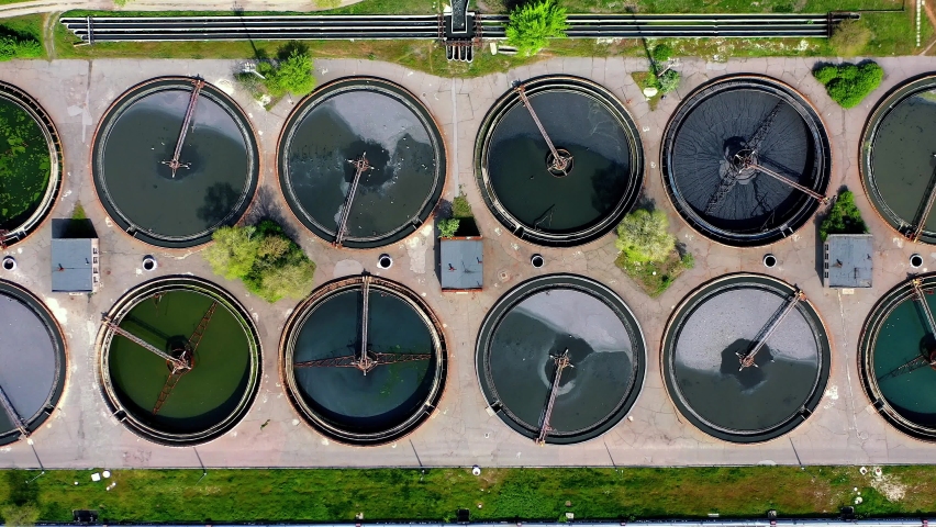 Aerial view of Aeration station, aerial view of wastewater treatment, Aerial view of modern industrial sewage treatment plant | Shutterstock HD Video #1090478069