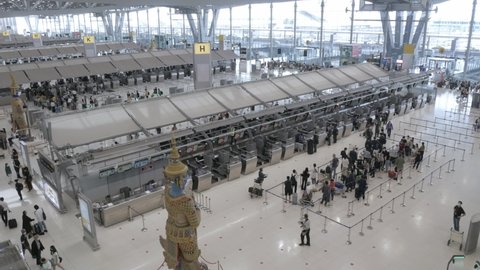 May 12,2022 : Bangkok, Thailand : POV inside the airport departure terminal  Suvannabhumi Airport with many passenger while reopening country