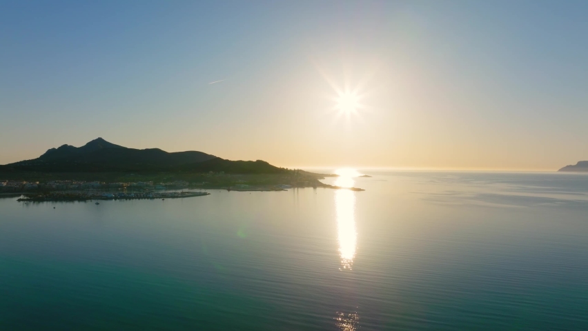 Aerial view of the beach in Palma de Mallorca with the town and harbor below beautiful coastline scenery Spain Mediterranean Sea, Balearic Islands.