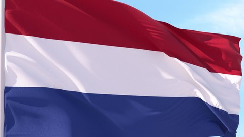 Holland Flag Looping Background fluttering in the wind against a blue sky on a seamless loop.