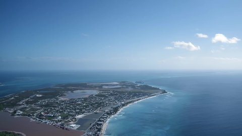 Drone view of Grand Turk island, Turks and Caicos, aerial panorama above Cockburn Town and the sea
