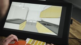 A professional graphic designer selects the color for the interior. A man works with modern equipment for designers and architects. - Powered by Shutterstock - Get 15% off with code: PIKWIZARD15