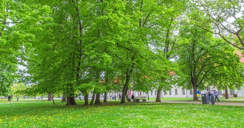MAY 20, 2022: People walking in the city park in Vilnius, Lithuania