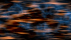 Fiery orange blur shapes and streaks