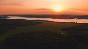 Panoramic view from a drone flying over a rural landscape at dawn. Footage from a bird's eye view. Location place Dniester canyon, Ukraine, Europe. Cinematic shot. Filmed UHD 4k video. Beauty earth.