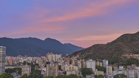 Panoramic timelapse of Caracas, sunrise views with clouds, Humboldt hotel and Avila in the background, capital district, Caracas - Venezuela.
