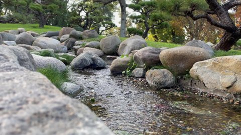 Small Stream at the Buenos Aires Japanese Garden (Jardin Japones), Public Garden in Buenos Aires, Argentina. 4K Resolution.