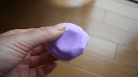 purple fluffy slime closeup video