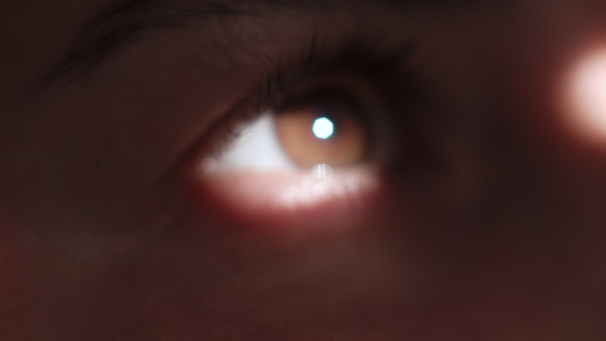 Macro View. Female Eyes in Darkness with Spot Light Directly in Retina Eyeball. Attractive Girl with Serious Sight on Laser Vision Correction Therapy, Iris Checking. Healthy Eyesight Concept. Closeup Royalty-Free Stock Footage #1090530487