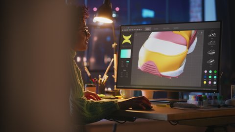 Progressive Female Designer Choose Colours and Rotate Object while Modelling 3D Shoe at Professional Desktop Computer. Black Woman Creating and Designing New 3D Model in CAD Program. Freelance Work