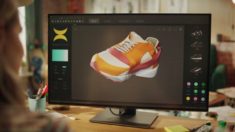 Over the Shoulder View of Teenage Female Comes Up with Design of Sneakers by Reproducing It in the Program for 3d Visualisation. She Changes Colour and Looking at Model from Different Sides. Close Up