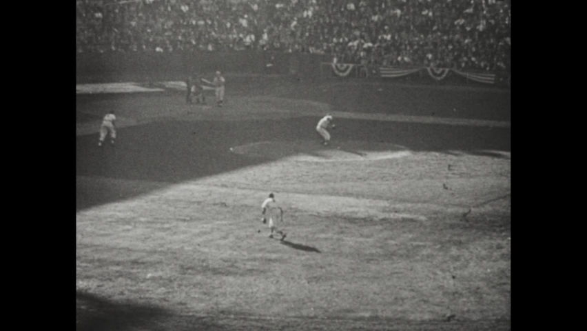 1940s: Players hit and field during 1944 World Series; slow-motion view of tag out.