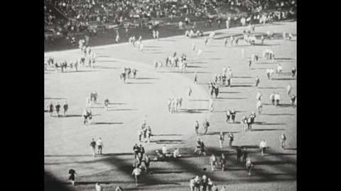 1940s: Players, fans cross baseball diamond after game; Intertitle reads 'Game 6'; Nelson Potter warms up on pitching mound.