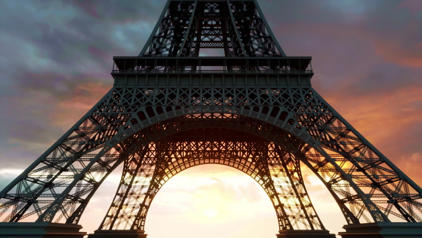 A close view of the Eiffel Tower's detailed wrought-iron structure as the camera moves from the base of the tower to the observation deck at the top.
