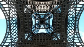 A view up through the center of the wrought-iron structure of the Eiffel Tower in Paris, France. - Powered by Shutterstock - Get 15% off with code: PIKWIZARD15