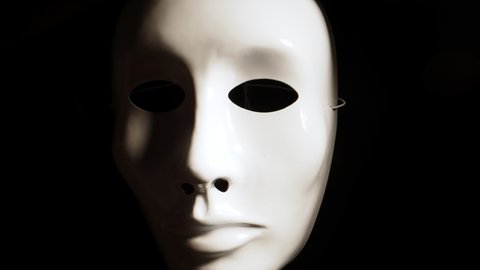 White Face Mask On Dark Background Stock Footage Video (100% Royalty