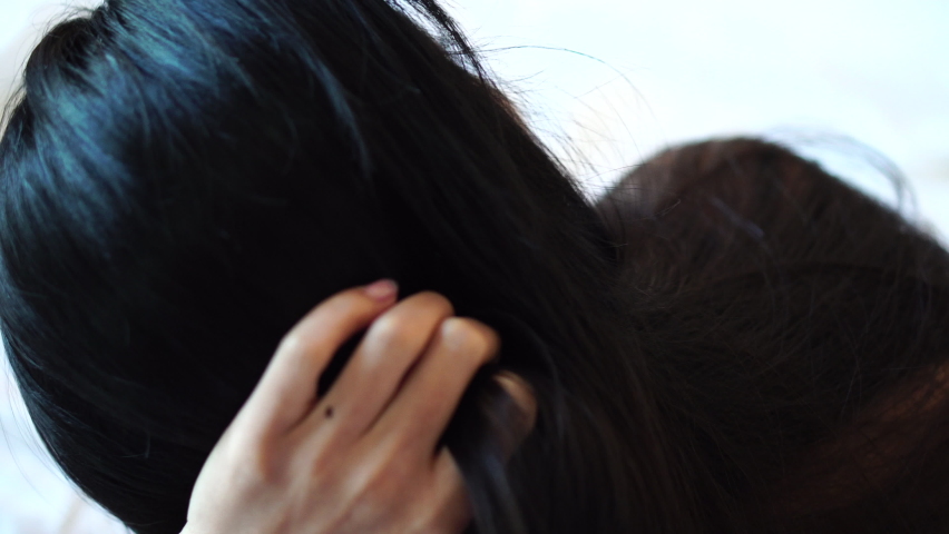 Young Sexy Woman Posing to Camera in Bed Wearing Nightdress