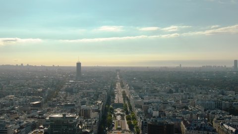 Establishing aerial view of France, Paris Arc de Triomphe Triumphal Arch and the Avenue des Champs Elysees	