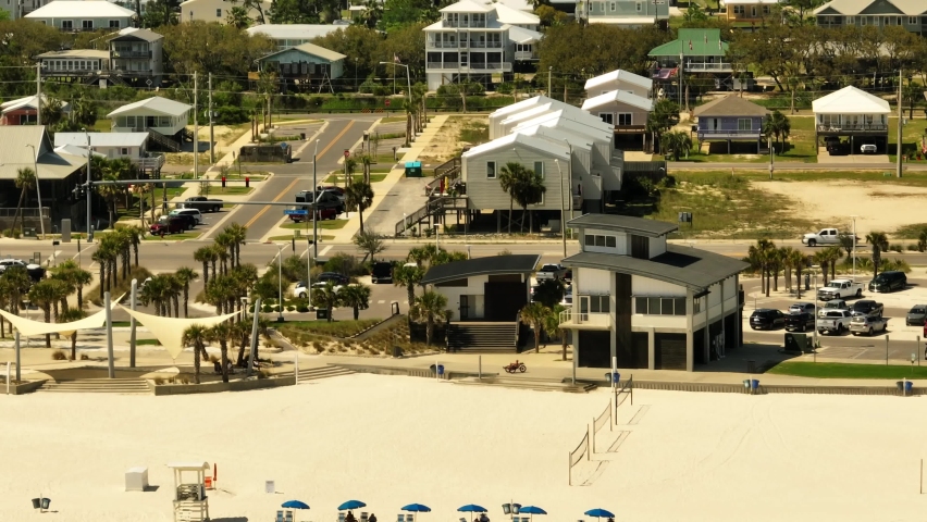 Lifeguard station and public bathrooms Gulf Shores Beach Alabama. 4k telephoto drone aerial