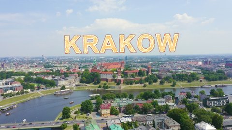Inscription on video. Krakow, Poland. Wawel Castle. Ships on the Vistula River. View of the historic center. Heat burns text, Aerial View