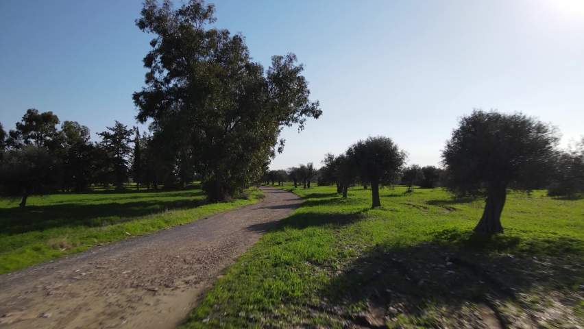 Cyprus green fields. Sea and waves. Fly over beautiful views near Larnaca. Cyprus. Mediterranean. Daytime.