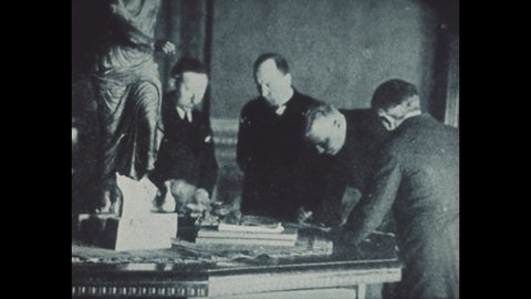 1940s: Hirohito and Mussolini signing paper together. Aerial view of Vatican buildings. German soldiers in uniform in newsprint. Group of military officers meeting. Mussolini portrait.