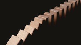 Row of wooden domino falling down against black background. Domino effect. - Powered by Shutterstock - Get 15% off with code: PIKWIZARD15