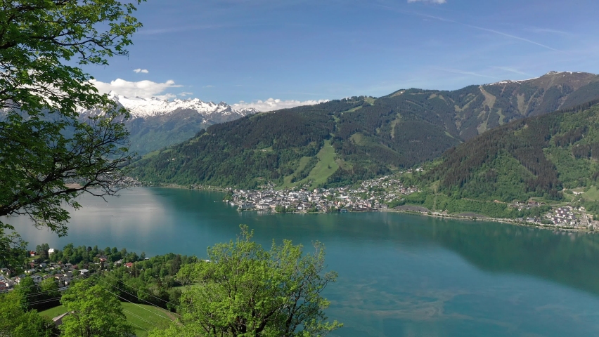 Panoramic view over Zell am See with the Hohen Tauern in the background, Salzburg, Austria Royalty-Free Stock Footage #1090576861