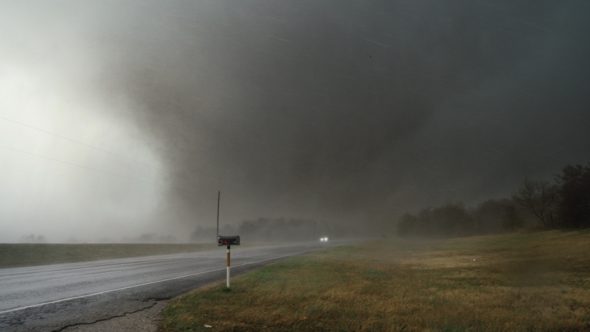 Storm Chasers Film A Large Tornado At Close Range During A Severe Weather Outbreak