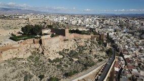 Alcazaba of Almeria and surrounding landscape, Spain. Aerial drone panoramic view