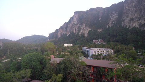 Cliffside Hotel Buildings With Stunning Nature Scenery In Krabi, Thailand. wide aerial, static