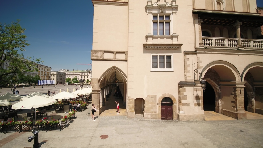 Aerial of Cloth Hall Sukiennice, the main square, in the Old Town of Krakow - Malopolska in southern Poland. Mary