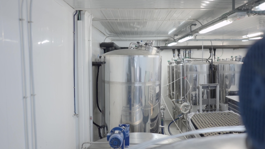 Metal Tanks, Craft Beer Brewing Equipment In Brewery - medium shot
