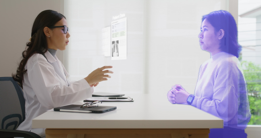 Medical specialist having conversation with patient at appointment in Doctor office. Online Conference Call from asian patient. Futuristic online Distant telehealth, telemedicine. Hologram Concept | Shutterstock HD Video #1090608473