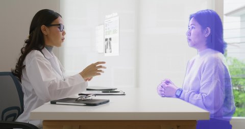 Medical specialist having conversation with patient at appointment in Doctor office. Online Conference Call from asian patient. Futuristic online Distant telehealth, telemedicine. Hologram Concept