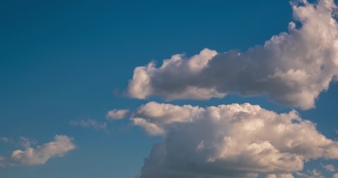 Timelapse of sky background with tiny fluffy clouds