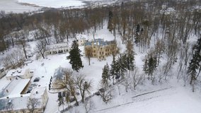 Aerial footage of Sturdza castle in Iasi county, Romania. Video was shot from a drone while flying forward towards the castle at a higher altitude. Drone footage of Romanian Baroque castle.